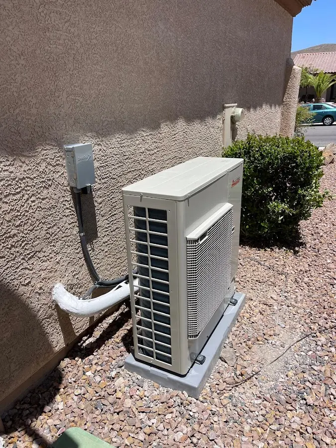 Residential air conditioning condenser unit in Baxter